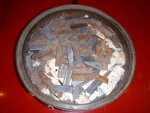 Samples of Metal and Brick that were broke in two.